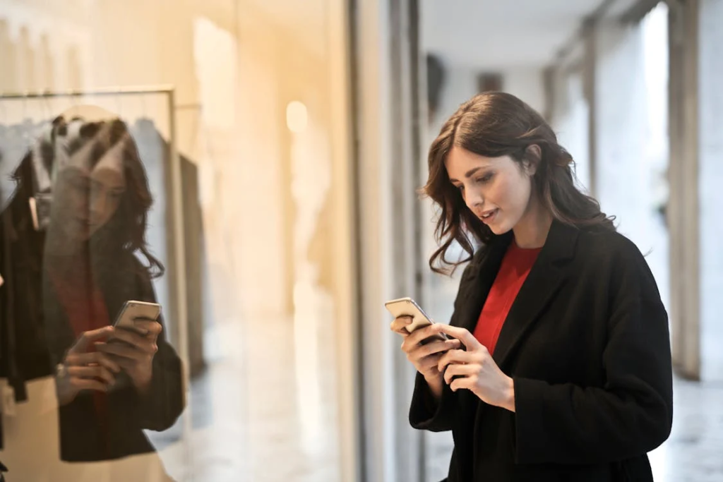 A woman shopping while on a smartphone