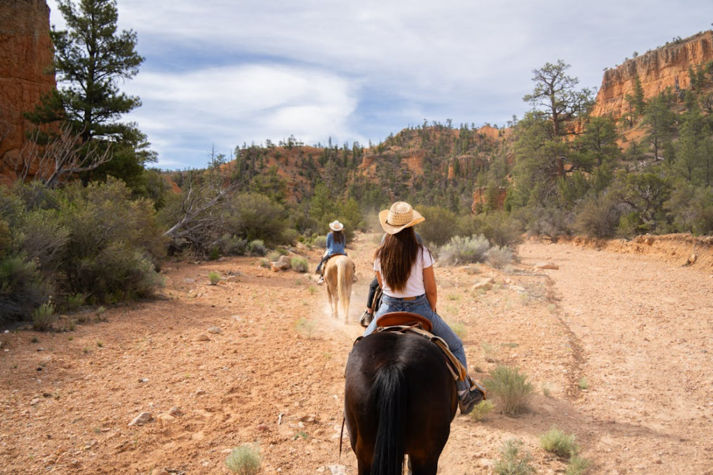 Two women riding horses in Utah