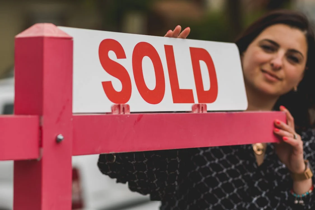 A sold sign outside of a house