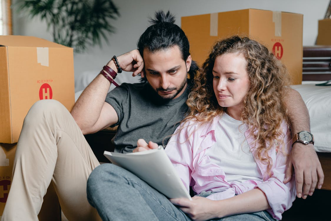 A couple writing a to-do list