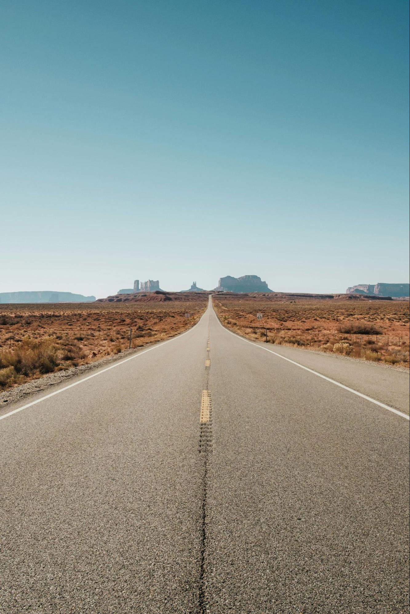 Open road amongst Arizona landscape