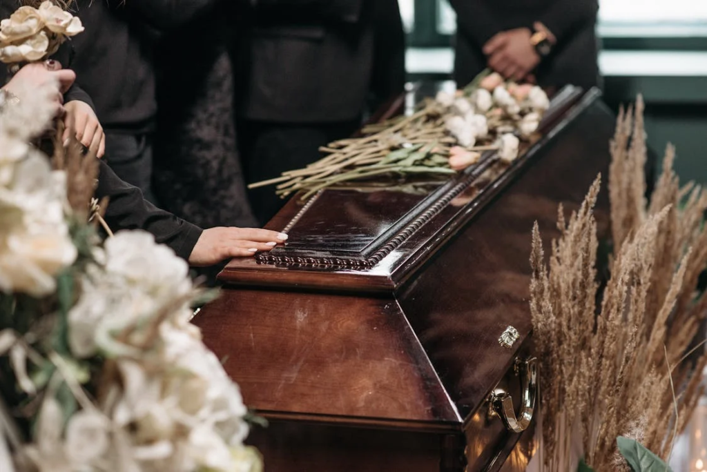 A wooden coffin at a funeral