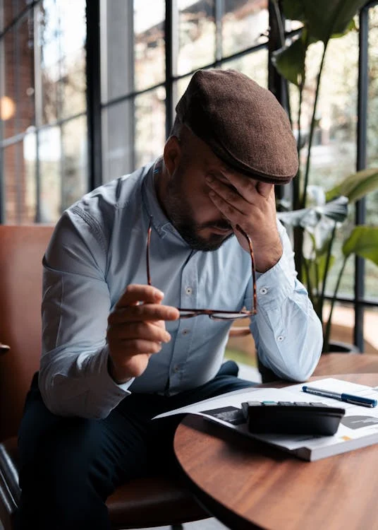 A man calculating taxes 