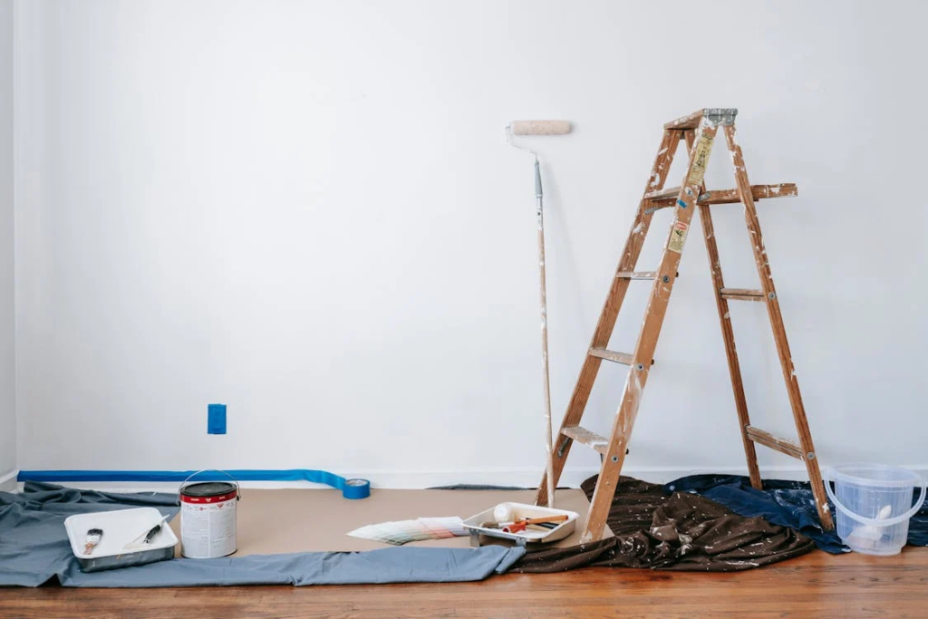 A ladder and a painting tool