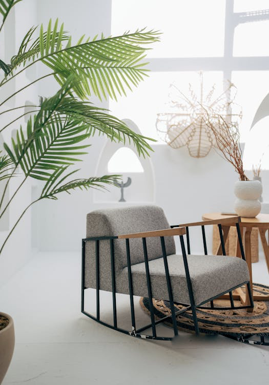 A modern grey chair in a home