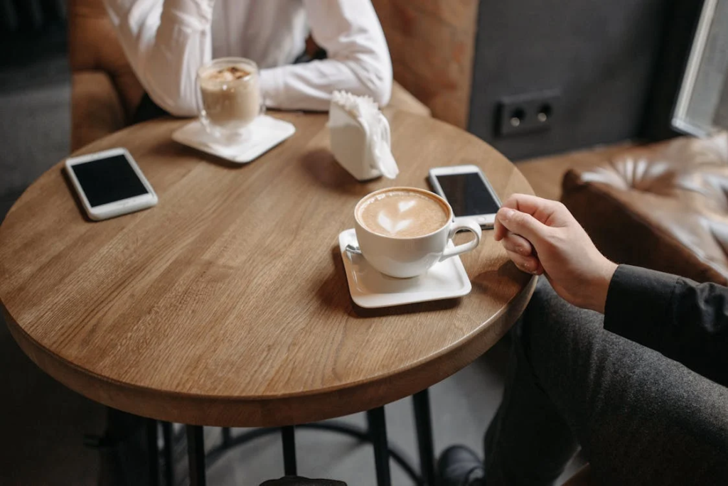 Two people having coffee