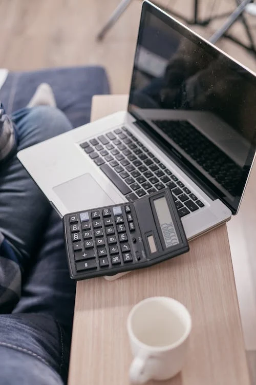 A laptop and a calculator