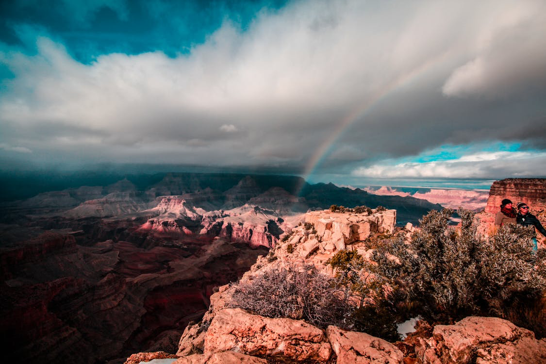 A rainbow in the background of mountains